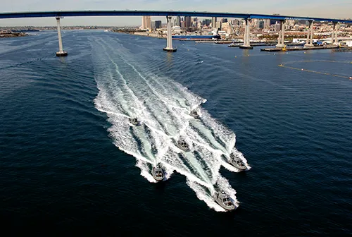 Fleet of ships at sea.