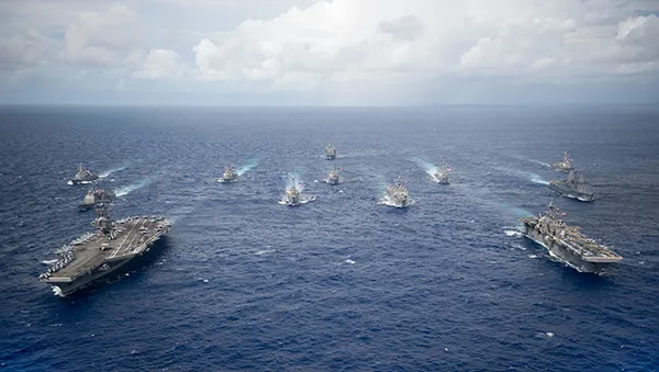 Fleet of ships at sea.