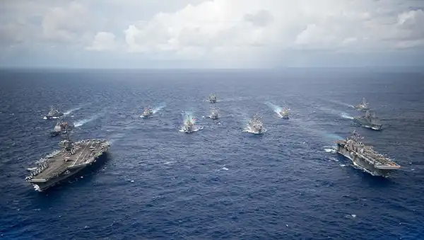 Fleet of ships at sea.